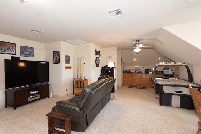 1265 Mourning Dove Ct, Salado, TX 76571 - living room featuring light colored carpet, a ceiling fan, and vaulted ceiling
