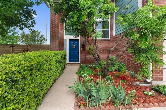 14708 Single Trce, Austin, TX 78728 - doorway to property with brick siding