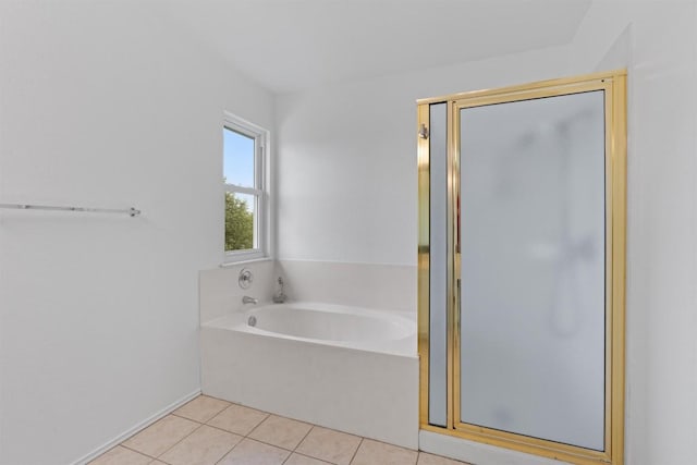 14708 Single Trce, Austin, TX 78728 - full bathroom featuring a shower stall, a garden tub, and tile patterned flooring