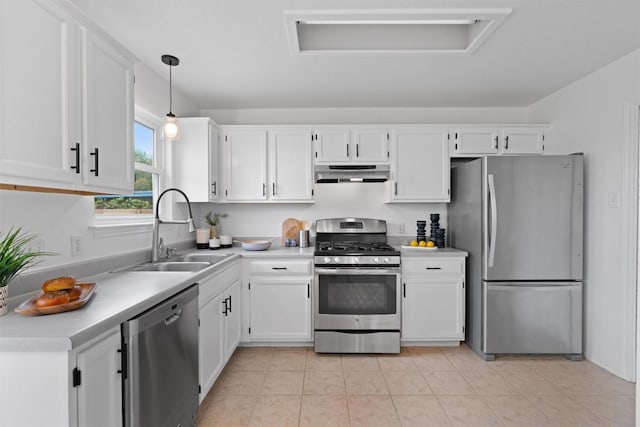 14708 Single Trce, Austin, TX 78728 - kitchen featuring appliances with stainless steel finishes, a sink, under cabinet range hood, and white cabinets