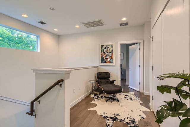 3001 Del Curto Rd Unit 11, Austin, TX 78704 - living area with an upstairs landing, wood finished floors, recessed lighting, and baseboards
