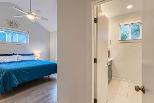 3001 Del Curto Rd Unit 11, Austin, TX 78704 - bedroom featuring vaulted ceiling, light wood finished floors, baseboards, a ceiling fan, and recessed lighting