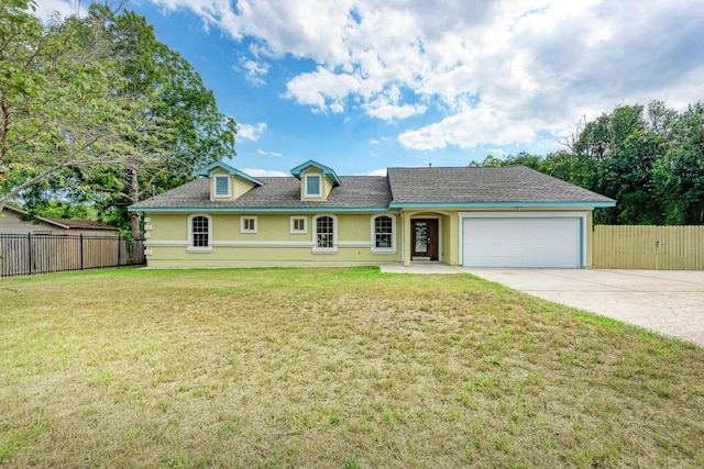 903 N Neans Dr, Austin, TX 78758 - view of front of home with stucco siding, concrete driveway, an attached garage, and a shingled roof