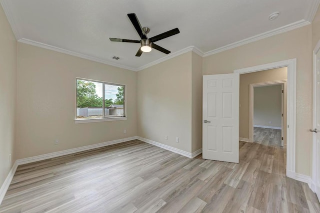 903 N Neans Dr, Austin, TX 78758 - unfurnished room featuring light wood-style floors, ceiling fan, crown molding, and a smoke detector