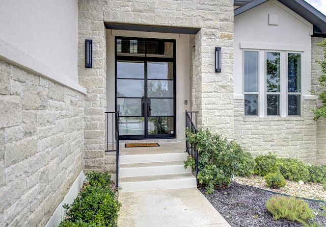 1916 Port Bari Ct, Leander, TX 78641 - property entrance with stone siding and french doors