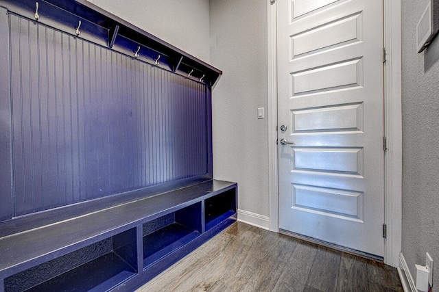 1916 Port Bari Ct, Leander, TX 78641 - mudroom with wood finished floors, a textured wall, and baseboards