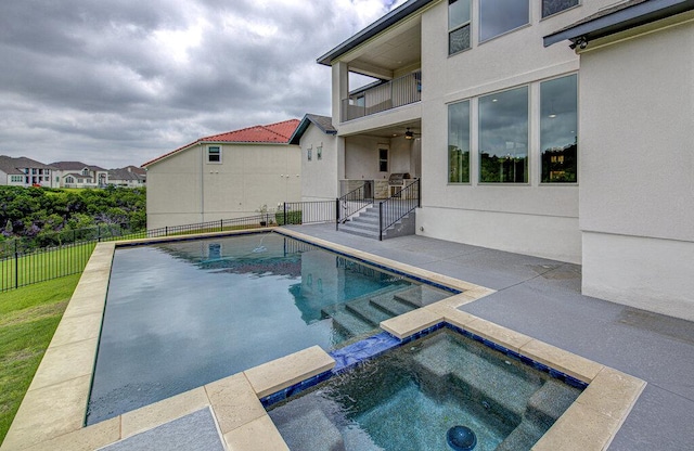 1916 Port Bari Ct, Leander, TX 78641 - view of pool featuring a patio area, a pool with connected hot tub, and a ceiling fan