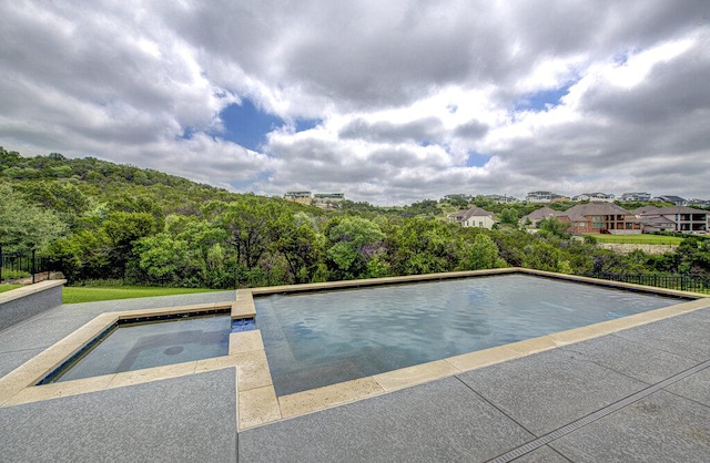 1916 Port Bari Ct, Leander, TX 78641 - outdoor pool featuring a view of trees