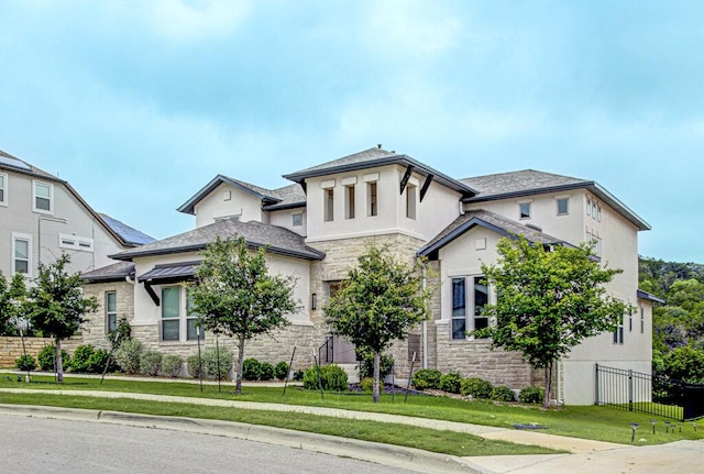 1916 Port Bari Ct, Leander, TX 78641 - view of front facade featuring stone siding and stucco siding