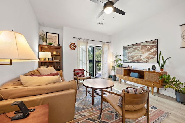 3101 Govalle Ave Unit 219, Austin, TX 78702 - living area with light wood-style flooring and a ceiling fan