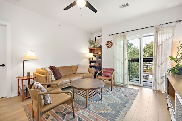 3101 Govalle Ave Unit 219, Austin, TX 78702 - living room featuring ceiling fan and light wood finished floors
