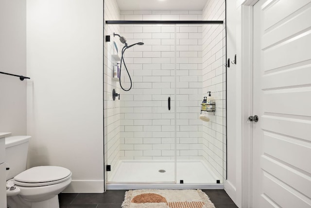 3101 Govalle Ave Unit 219, Austin, TX 78702 - full bath with tile patterned floors, a shower stall, and toilet
