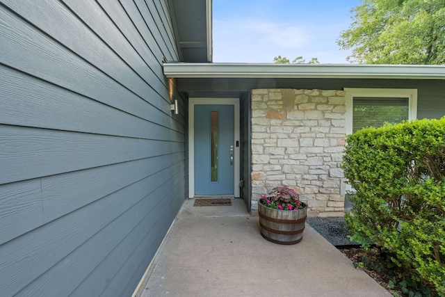 6610 Greensboro Dr, Austin, TX 78723 - entrance to property with stone siding