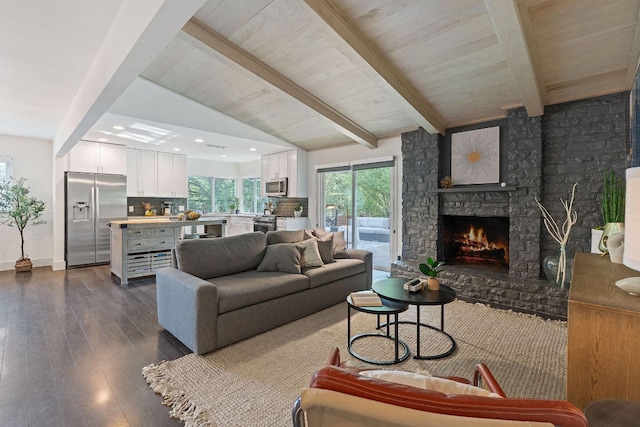 6610 Greensboro Dr, Austin, TX 78723 - living area with dark wood finished floors and a stone fireplace