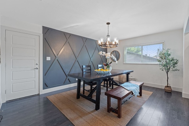 6610 Greensboro Dr, Austin, TX 78723 - dining room featuring a chandelier, dark wood-type flooring, and a decorative wall