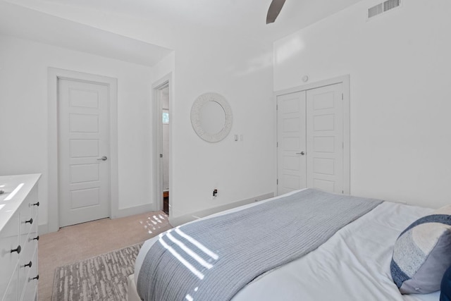 6610 Greensboro Dr, Austin, TX 78723 - carpeted bedroom featuring a closet and ceiling fan