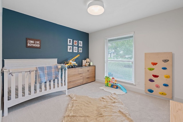 6610 Greensboro Dr, Austin, TX 78723 - carpeted bedroom featuring a nursery area