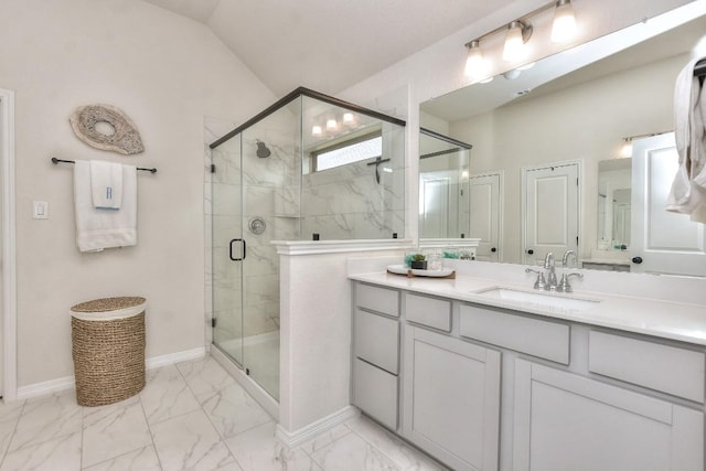 311 Westfield St, Hutto, TX 78634 - bathroom with marble finish floors, vanity, a shower stall, and lofted ceiling