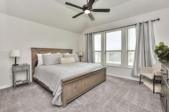 311 Westfield St, Hutto, TX 78634 - bedroom featuring light carpet, lofted ceiling, and ceiling fan
