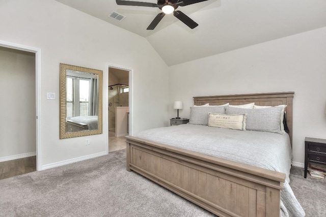 311 Westfield St, Hutto, TX 78634 - bedroom featuring light carpet, lofted ceiling, ceiling fan, and ensuite bathroom