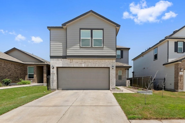 7212 Summer Tanager Dr Unit 28, Austin, TX 78744 - view of front of house featuring an attached garage, driveway, and brick siding