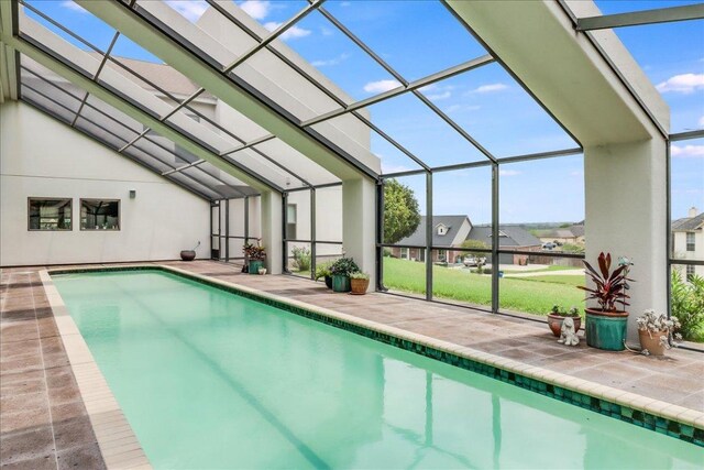 14722 Beal Dr, Corpus Christi, TX 78410 - outdoor pool with a patio area, glass enclosure, and a lawn