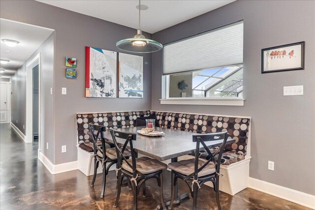 14722 Beal Dr, Corpus Christi, TX 78410 - dining space featuring finished concrete flooring and baseboards