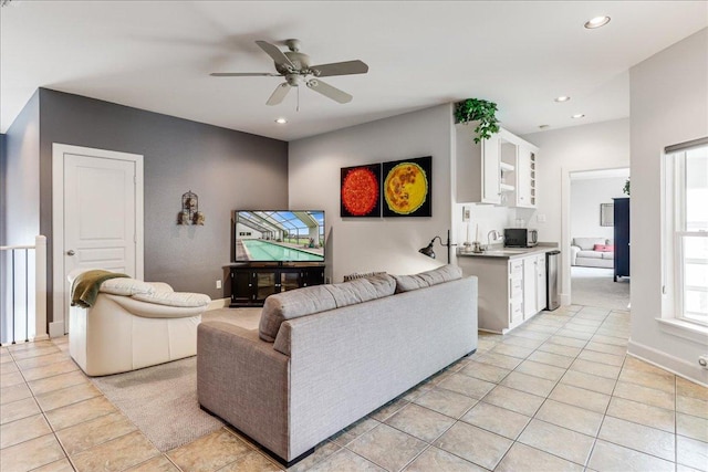 14722 Beal Dr, Corpus Christi, TX 78410 - living area with light tile patterned floors, ceiling fan, recessed lighting, and baseboards