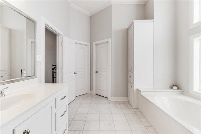 14722 Beal Dr, Corpus Christi, TX 78410 - bathroom featuring ornamental molding, vanity, a bath, and tile patterned flooring