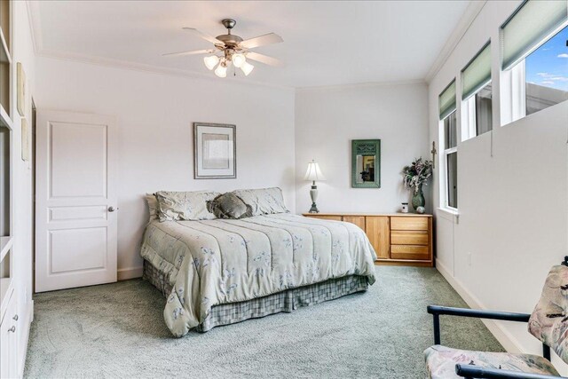 14722 Beal Dr, Corpus Christi, TX 78410 - carpeted bedroom with ornamental molding, baseboards, and a ceiling fan