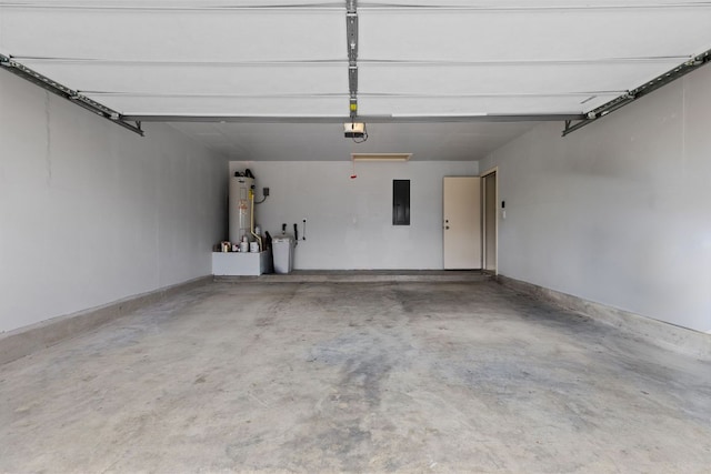 1105 Hawkeye Point Rd, Georgetown, TX 78626 - garage featuring electric panel, gas water heater, and a garage door opener