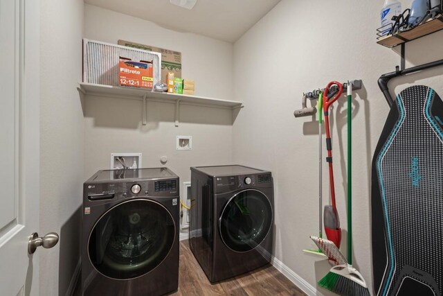 408 Rainmaker Ln, Bastrop, TX 78602 - washroom featuring wood finished floors, washing machine and dryer, and baseboards
