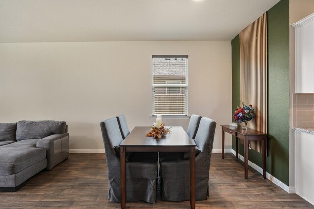 408 Rainmaker Ln, Bastrop, TX 78602 - dining room with dark wood finished floors and baseboards