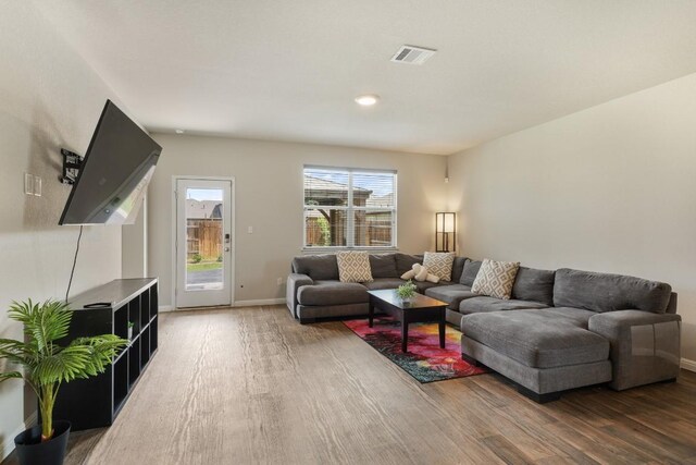 408 Rainmaker Ln, Bastrop, TX 78602 - living area with wood finished floors and baseboards