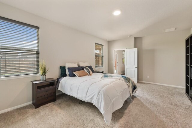 408 Rainmaker Ln, Bastrop, TX 78602 - carpeted bedroom featuring baseboards