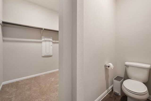 408 Rainmaker Ln, Bastrop, TX 78602 - bathroom with toilet and baseboards