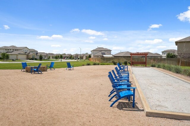 408 Rainmaker Ln, Bastrop, TX 78602 - view of property's community with a residential view and a game area