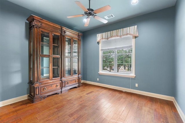 8212 Denali Pkwy, Austin, TX 78726 - spare room featuring wood finished floors and a ceiling fan
