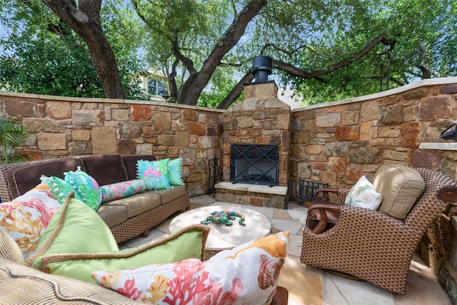 8212 Denali Pkwy, Austin, TX 78726 - view of patio featuring an outdoor living space with a fireplace