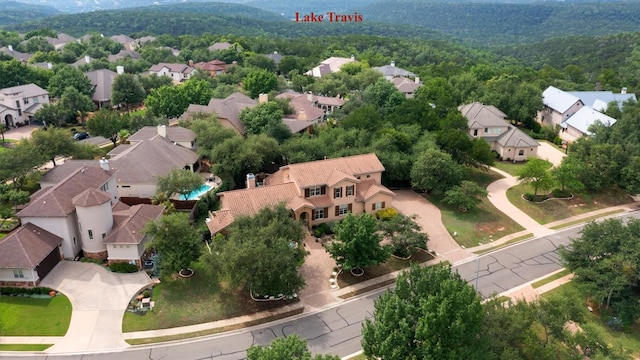 8212 Denali Pkwy, Austin, TX 78726 - aerial perspective of suburban area with a heavily wooded area