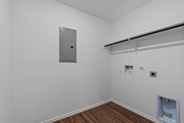 241 Madrid, Kyle, TX 78640 - laundry area featuring hookup for a gas dryer, hookup for an electric dryer, electric panel, washer hookup, and dark wood-style floors