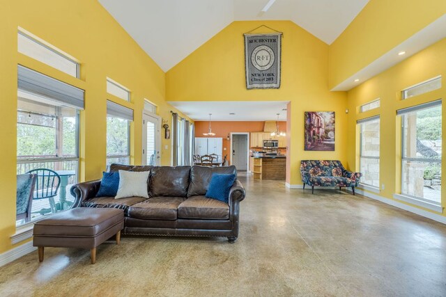 1608 Susan Dr, Austin, TX 78734 - living room featuring high vaulted ceiling and concrete flooring
