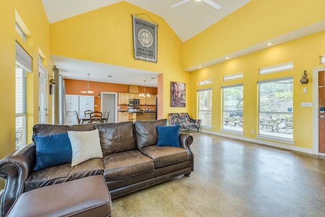 1608 Susan Dr, Austin, TX 78734 - living area with plenty of natural light, high vaulted ceiling, a chandelier, and baseboards