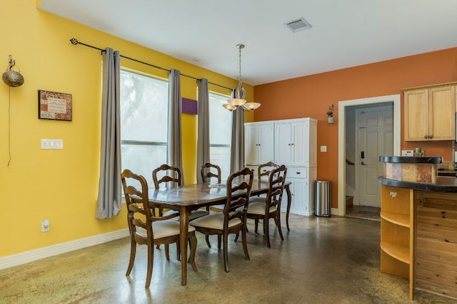 1608 Susan Dr, Austin, TX 78734 - dining space with baseboards and concrete floors