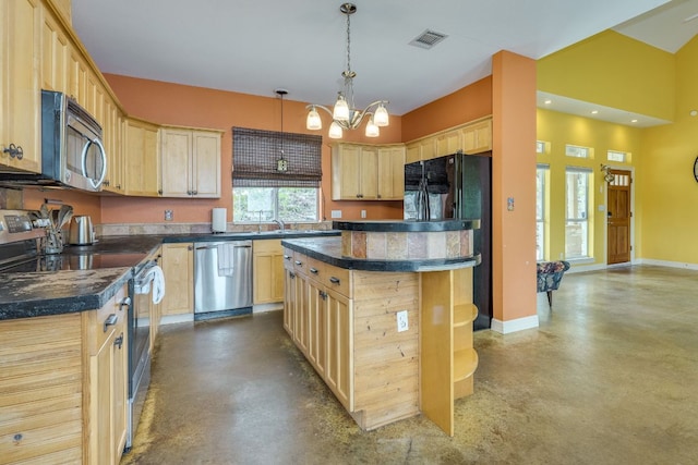 1608 Susan Dr, Austin, TX 78734 - kitchen with appliances with stainless steel finishes, finished concrete flooring, light brown cabinets, and dark countertops