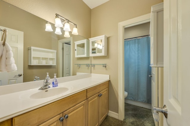 1608 Susan Dr, Austin, TX 78734 - full bathroom with vanity, toilet, a shower with shower curtain, and baseboards