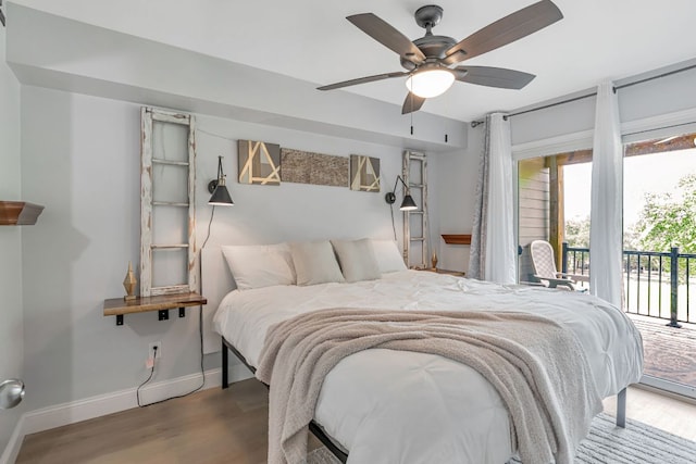 551 Demarett Dr Unit 4, Point Venture, TX 78645 - bedroom featuring access to exterior, wood finished floors, baseboards, and a ceiling fan