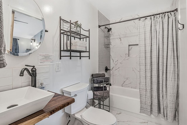 551 Demarett Dr Unit 4, Point Venture, TX 78645 - bathroom featuring toilet, shower / bath combo, marble finish floors, and vanity