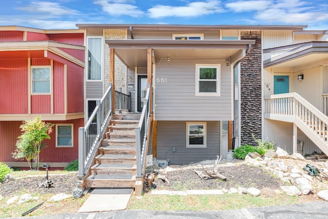 551 Demarett Dr Unit 4, Point Venture, TX 78645 - view of front of home featuring stairway