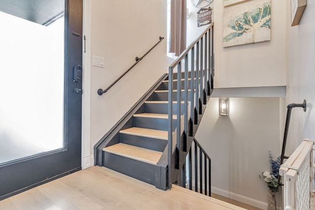 551 Demarett Dr Unit 4, Point Venture, TX 78645 - stairway featuring wood finished floors